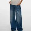 Jeans med vid benpassform og middels høy midje