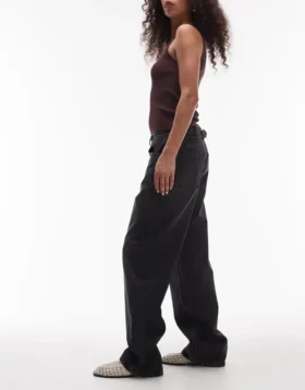 Tscinch-jeans med lav midje og vid passform