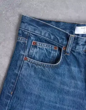 Tscinch-jeans med lav midje og vid passform