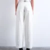 Tscinch-jeans med lav midje og vid passform