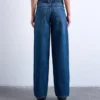 Tscinch-jeans med lav midje og vid passform