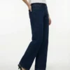 Tscinch-jeans med lav midje og vid passform