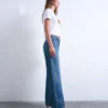 Tsember-jeans med lav midje og vid passform