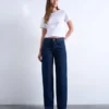 Tsember-jeans med lav midje og vid passform