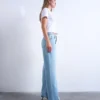 Tsember-jeans med lav midje og vid passform